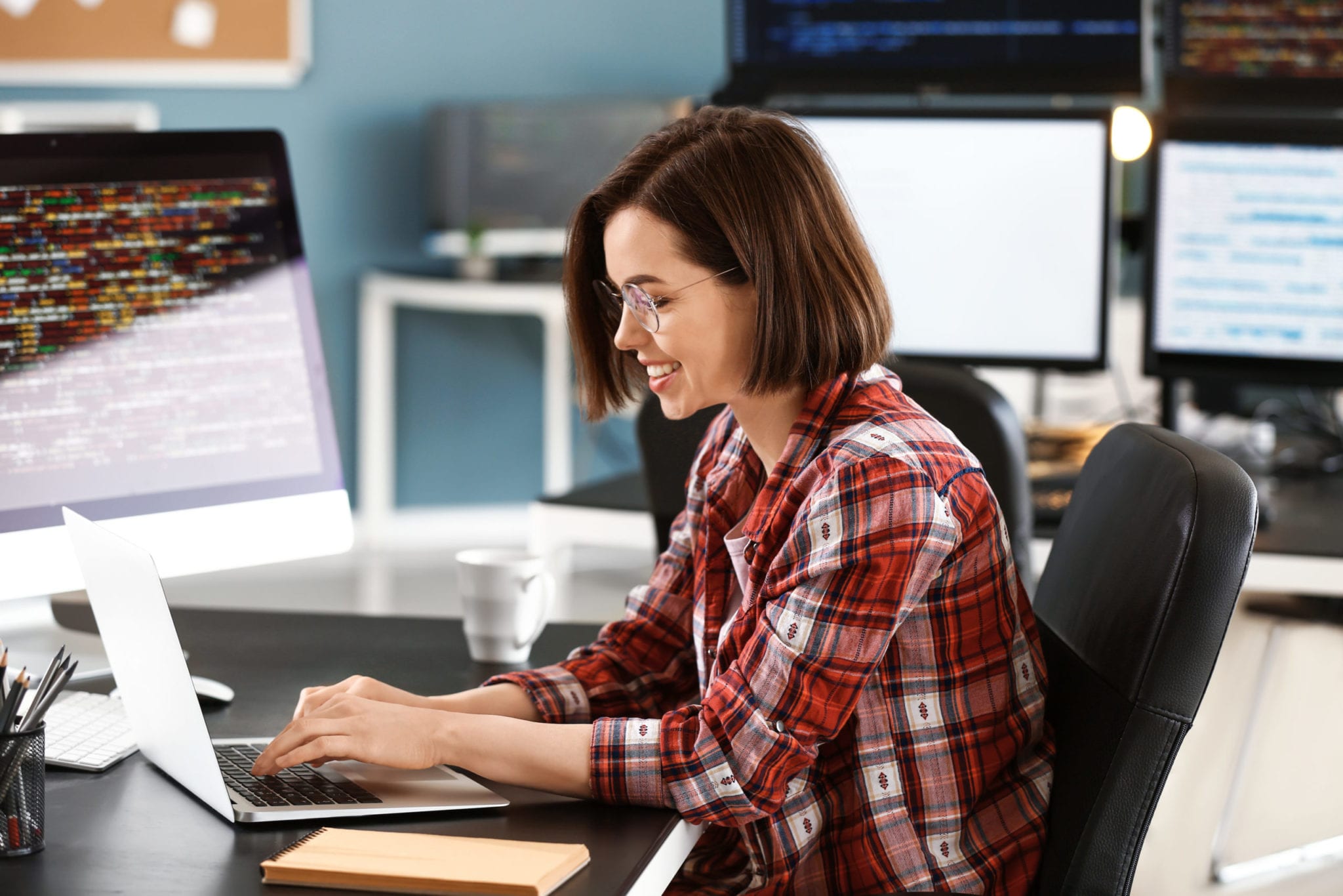 Female programmer working in office
